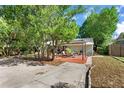 Brick patio with pergola and outdoor seating at 1006 E Fern St, Tampa, FL 33604