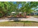 House exterior showcasing landscaping and driveway at 1006 E Fern St, Tampa, FL 33604