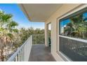 Private balcony overlooking lush greenery at 19610 Gulf Blvd # 409, Indian Shores, FL 33785