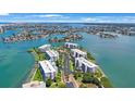 Aerial view of waterfront community, showcasing its prime location at 8001 Sailboat Key S Blvd # 204, St Pete Beach, FL 33707