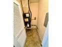 Small room with HVAC unit and laundry hookups at 5816 Congress St # 104, New Port Richey, FL 34653