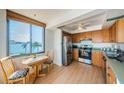 Bright kitchen with stainless steel appliances and water view at 6268 Palma Del Mar S Blvd # 406, St Petersburg, FL 33715