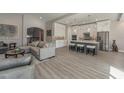 Modern kitchen with island, stainless steel appliances, and white cabinets at 17B Franklin S Ct, St Petersburg, FL 33711