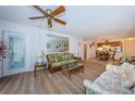 Open living area with adjacent dining and kitchen at 12760 Indian Rocks Rd # 1036, Largo, FL 33774