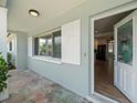 Inviting front porch with view into the renovated interior at 2347 Eastwood Dr, Clearwater, FL 33765