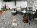 Relaxing patio area with seating and decorative elements at 2646 Cheryle Ln, Sarasota, FL 34237