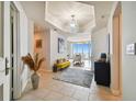 Bright and spacious entryway with a view to the living room at 5823 Bowen Daniel Dr # 905, Tampa, FL 33616