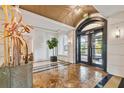 Elegant lobby with high ceilings and modern art at 5823 Bowen Daniel Dr # 905, Tampa, FL 33616