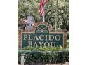 Placido Bayou community entrance sign at 379 Fan Palm Ne Ct # 0, St Petersburg, FL 33703