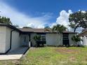 Updated single story home with modern exterior and landscaping at 9197 79Th Ave, Seminole, FL 33777