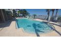 Inviting swimming pool with a water feature at 2201 Bay Club Cir, Tampa, FL 33607