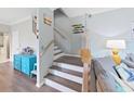 Modern staircase with light wood treads at 577 Vista Trail Ct, Palm Harbor, FL 34683