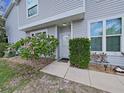 Inviting exterior with well-maintained landscaping and walkway at 577 Vista Trail Ct, Palm Harbor, FL 34683