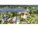 A waterfront home featuring pristine landscaping, vibrant greenery, and easy access to nearby amenities at 4234 4Th S St, St Petersburg, FL 33705