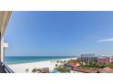 Stunning panoramic ocean view from condo balcony, showcasing beach and coastline at 3820 Gulf Blvd # 608, St Pete Beach, FL 33706