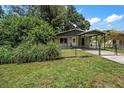 Charming bungalow with carport and fenced yard at 6199 59Th N Pl, St Petersburg, FL 33709