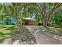 Cute bungalow with carport and mature landscaping at 4984 Oxford N Ave, St Petersburg, FL 33710