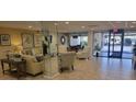 Building Lobby with comfortable seating at 1651 Sand Key Estates Ct # 74, Clearwater Beach, FL 33767