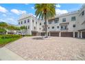 Modern building with attached garages at 158 Brightwater Dr # 1, Clearwater Beach, FL 33767