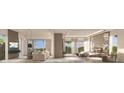 Spacious main bedroom with sitting area and water views at 5701 Bowen Daniel Dr. # 1 Villa, Tampa, FL 33616
