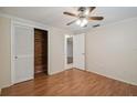 Spacious bedroom with wood flooring and built-in closet at 4244 Tamargo Dr, New Port Richey, FL 34652