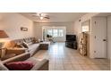 Spacious living room featuring a sectional sofa and ample natural light at 1245 S Martin Luther King Jr Ave # 304, Clearwater, FL 33756