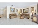 Cozy living room with tile floors, comfortable seating, and decorative accents that create a welcoming space at 3128 59Th S St # 214, Gulfport, FL 33707