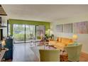 Spacious living room with sliding glass doors at 308 Mariner Dr # 308, Tarpon Springs, FL 34689