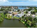 Canal-front home with private pool and lush landscaping at 6460 Fairway View S Blvd, St Petersburg, FL 33707