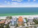 Luxury beachfront condo building with ocean and beach views at 19820 Gulf Blvd # 401, Indian Shores, FL 33785