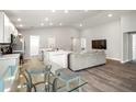 Open concept kitchen with stainless steel appliances and an island at 102 Eagle Summit Dr, Ruskin, FL 33570