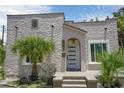 Spanish style home with stucco exterior, landscaping, and front porch at 1817 20Th S Ave, St Petersburg, FL 33712