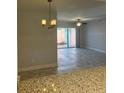 Bright dining area with access to the kitchen and view to backyard at 1211 N Mcmullen Booth Rd # 1211, Clearwater, FL 33759
