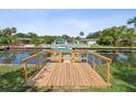 Wooden dock with water access, great for boats and relaxing by the water at 5425 Waters Edge Dr, New Port Richey, FL 34653