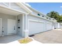 Side view of two story house with attached garages at 7535 62Nd N Way, Pinellas Park, FL 33781