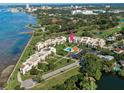 Aerial view of condo building and surroundings at 50 Coe Rd # 311, Belleair, FL 33756