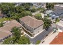 An aerial view showing the roofline and backyard deck of a multi-story home at 3201 W Horatio St # A, Tampa, FL 33609