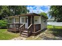 Quaint single-story home with a wooden deck at 2805 58Th N Pl, St Petersburg, FL 33714