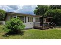 Cozy single-story home with small deck and yard at 2805 58Th N Pl, St Petersburg, FL 33714