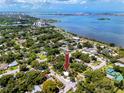 An aerial view showcasing the home's location near the water and city at 1049 Marine St, Clearwater, FL 33755