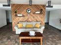 Lobby with wood wall and comfortable seating at 2587 Countryside Blvd # 6204, Clearwater, FL 33761
