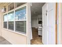 Inviting condo entry with view into living area at 4001 58Th N St # 16, Kenneth City, FL 33709