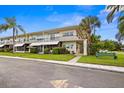 Two story building with lush landscaping at 4001 58Th N St # 16, Kenneth City, FL 33709