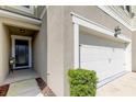 Townhouse garage and entryway at 2313 Sunset Wind Loop, Oldsmar, FL 34677