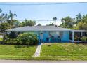 Charming bungalow with lush landscaping at 5 158Th Ave, Redington Beach, FL 33708