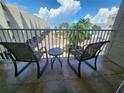 Balcony with patio furniture and water view at 2506 N Rocky Point Dr # 356, Tampa, FL 33607
