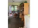 Dining room with built-in hutch and chandelier at 385 Dolphin Se Ave, St Petersburg, FL 33705