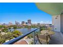 Balcony with city and lake views; table and chairs for relaxing at 777 3Rd N Ave # 1204, St Petersburg, FL 33701