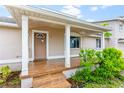 One story home with a front porch at 651 Jungle Queen Way, Longboat Key, FL 34228