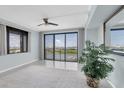 Bright and airy living room with floor to ceiling windows offering spectacular views of the water at 6 Belleview Blvd # 706, Belleair, FL 33756
